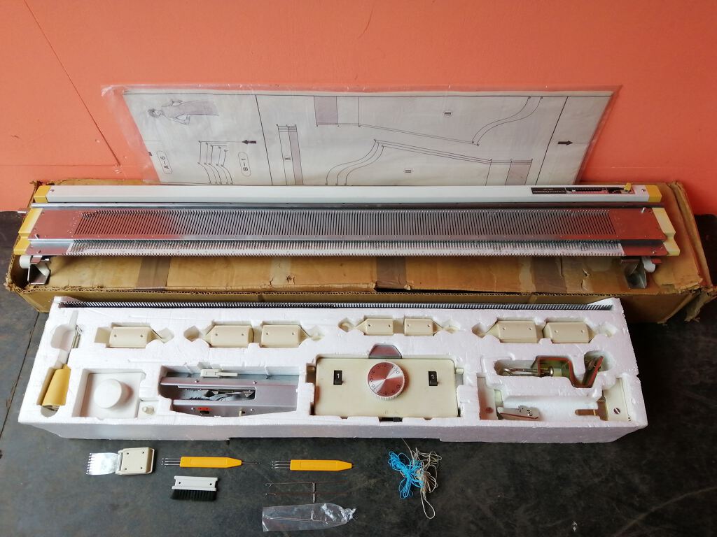 Ribbing attachment for knitting machine